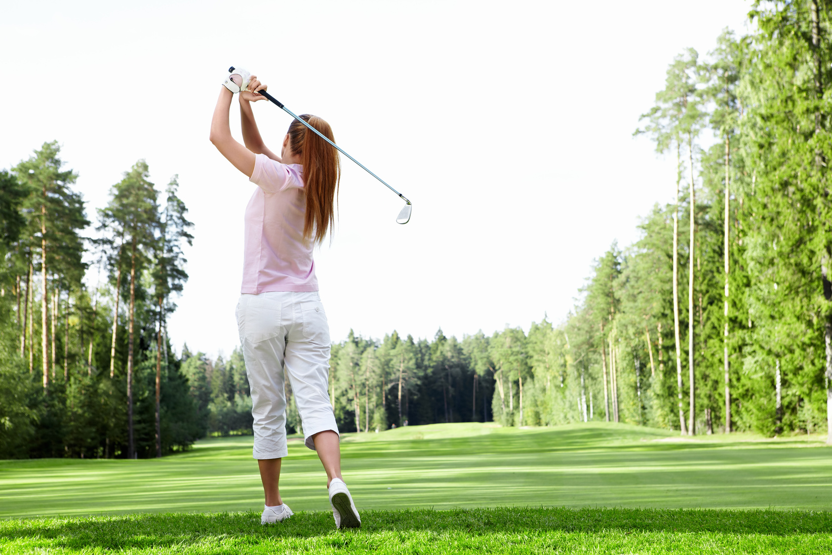 Young Girl Playing Golf